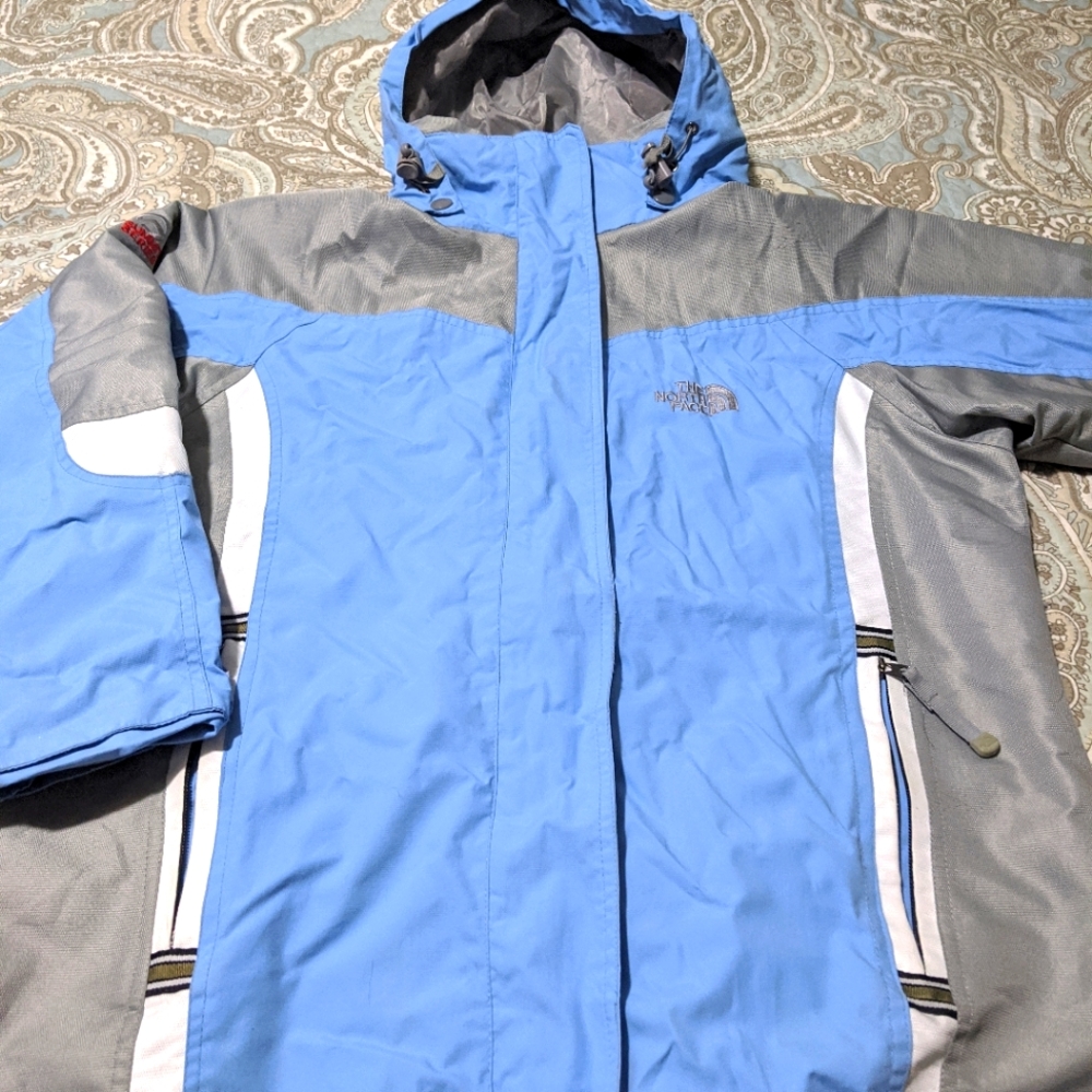 The North Face Hyvent jacket size M, blue grey white.
